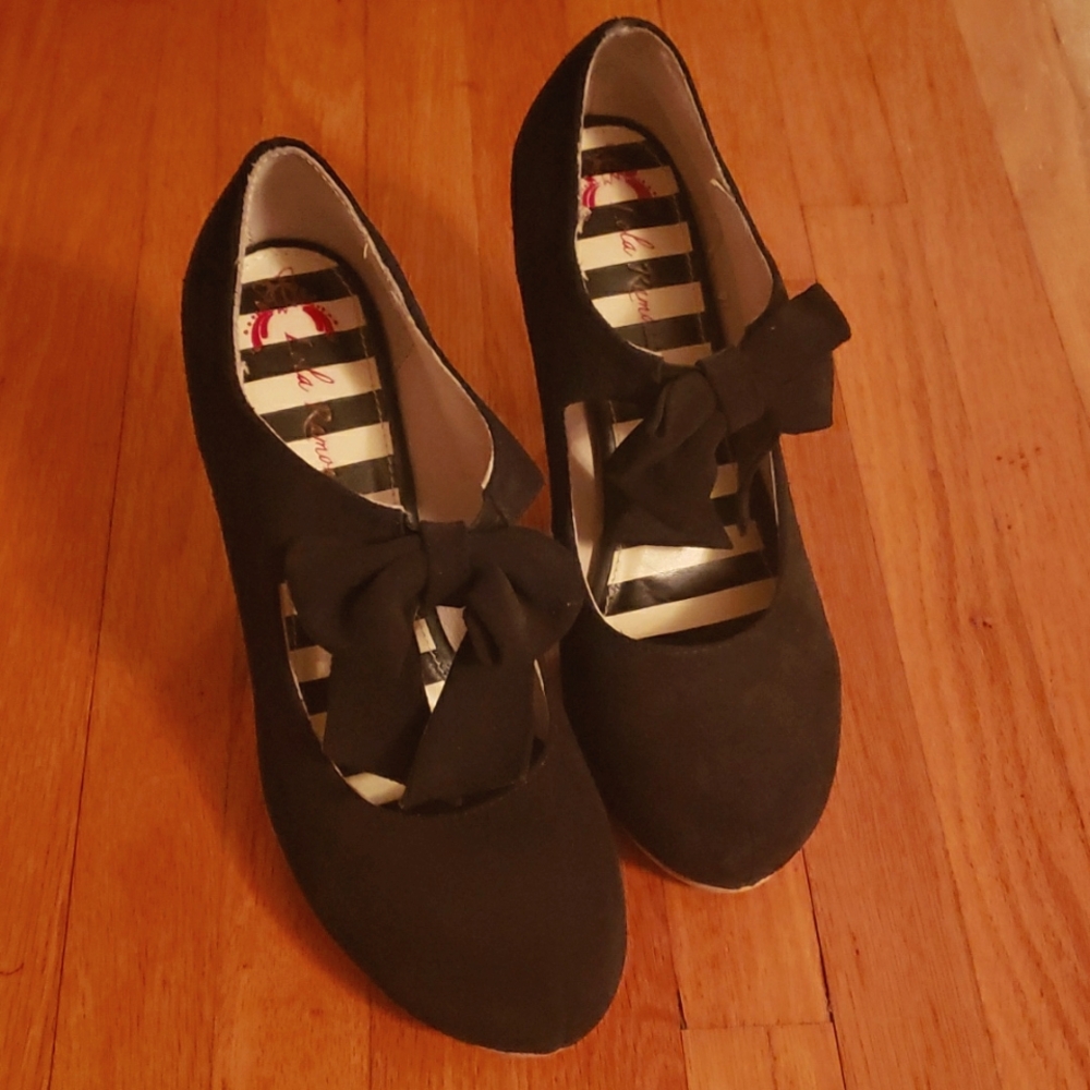 Lola Ramona black heels, size 10, suede type feel. Only worse a few times.